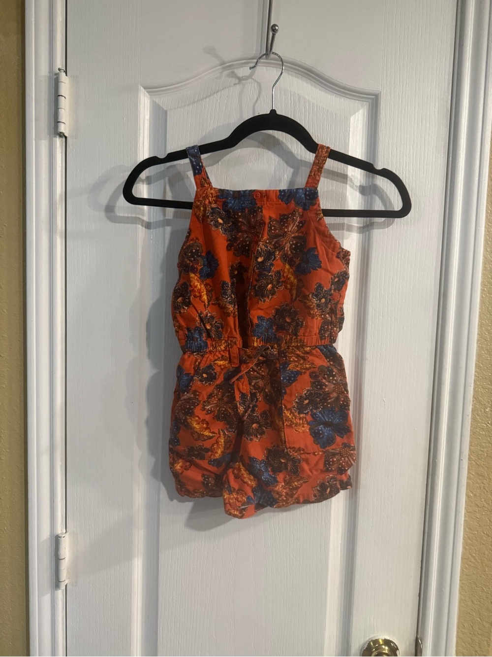 Girl’s Orange Floral Sleeveless Romper
